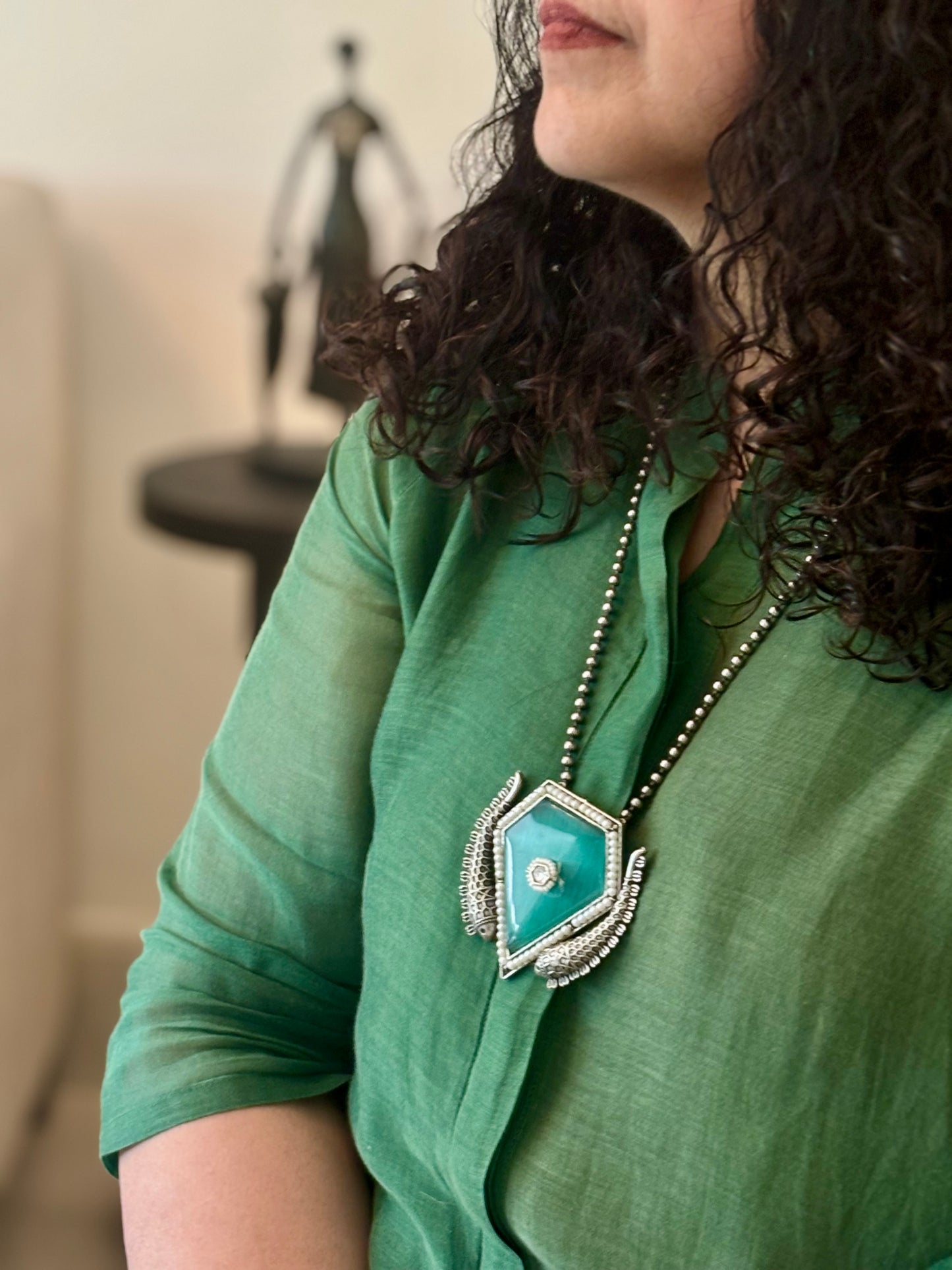 Farzeen pendant on metal beads chain