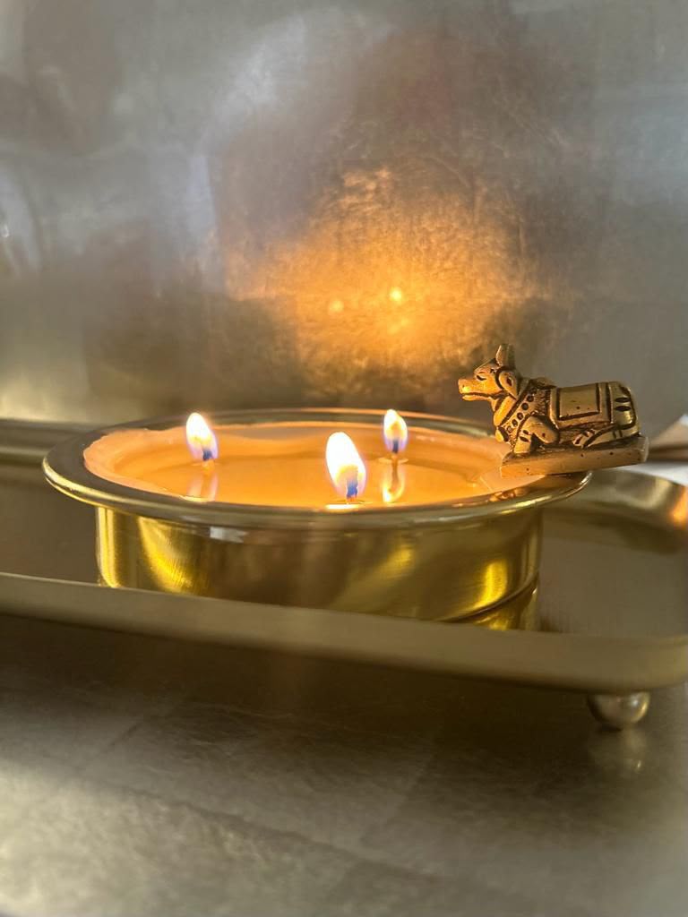 Nandi Glow, metal candle