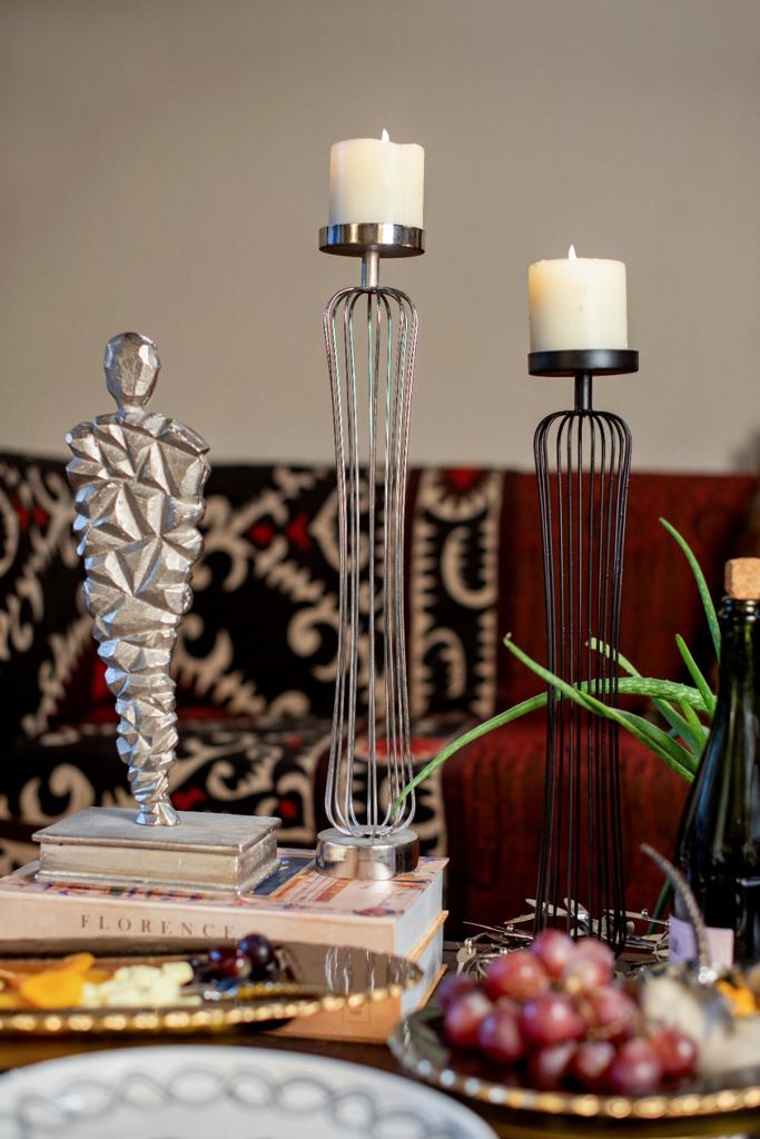 Image of ember candle stand from august.org.in with sculpture