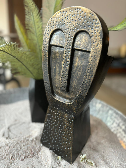 Agantuk sculpture in Deep Bronze from august.org.in