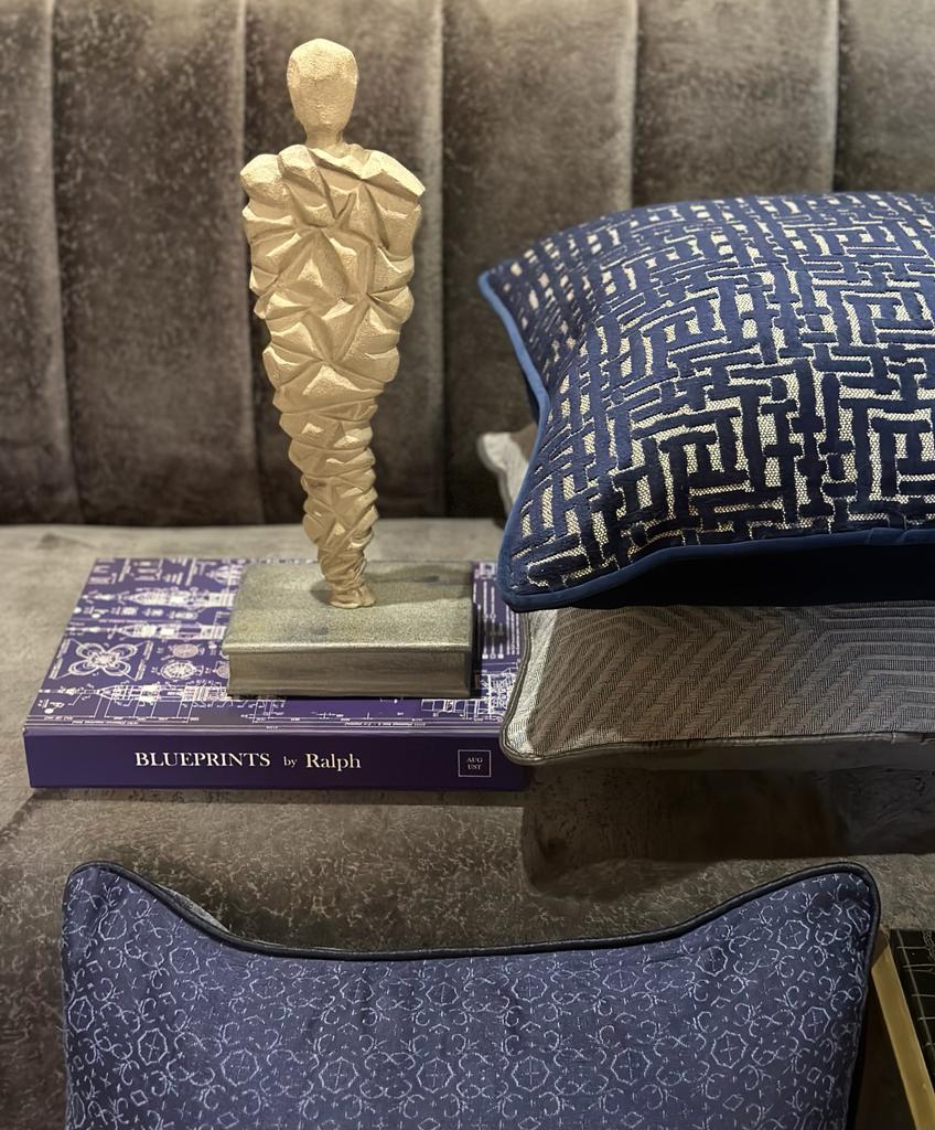 Two cushions with plants