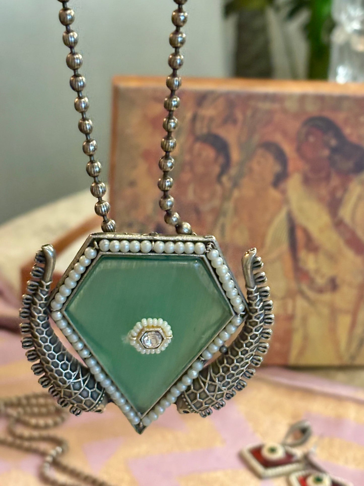 Farzeen pendant on metal beads chain