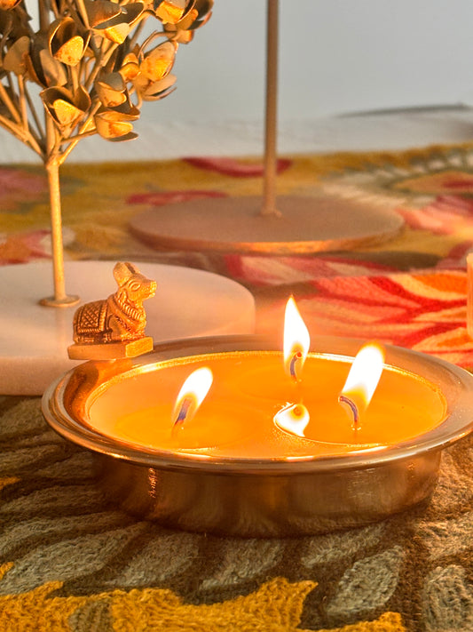 Nandi Glow, metal candle