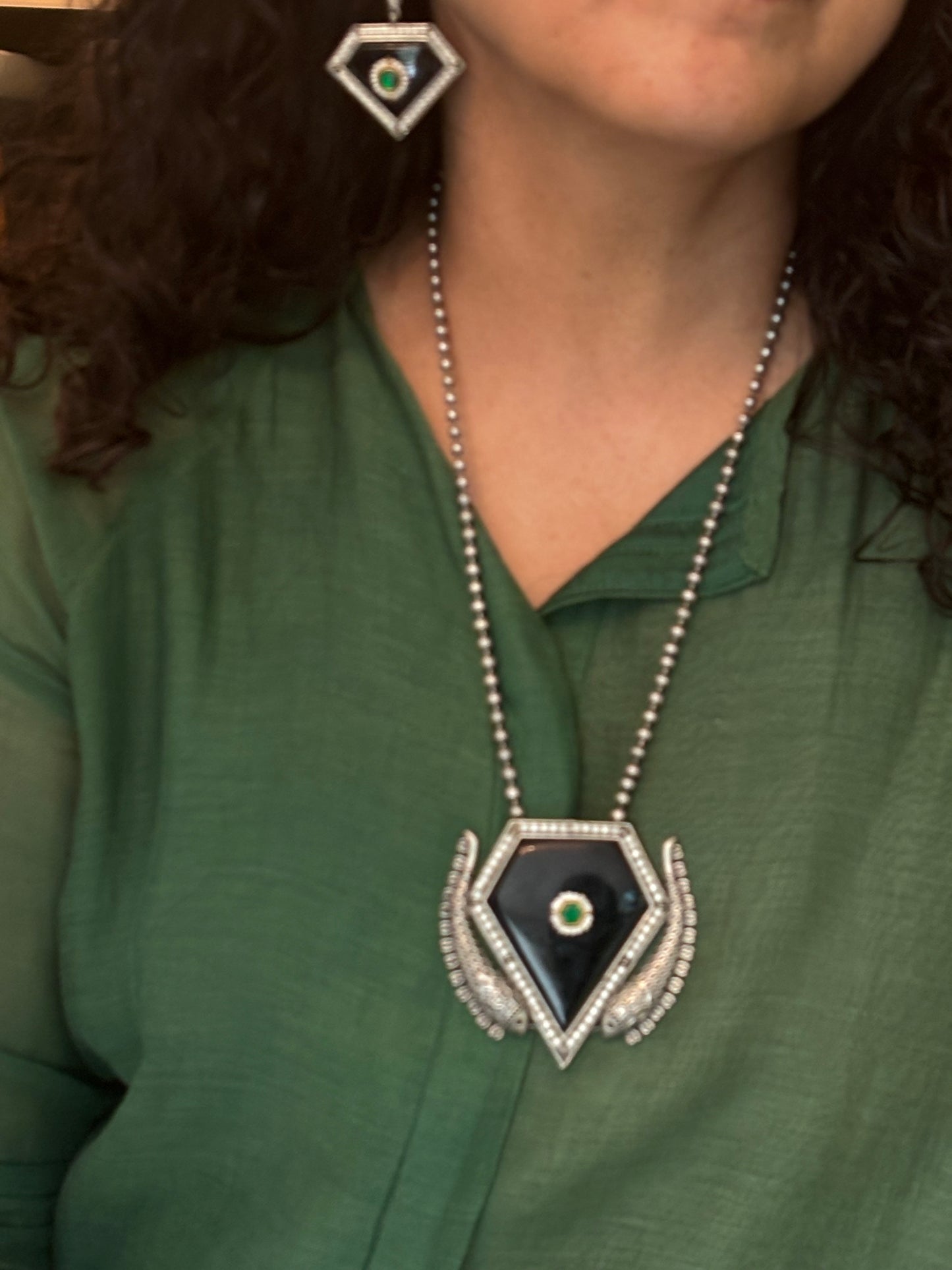 Naadia pendant on metal beads string