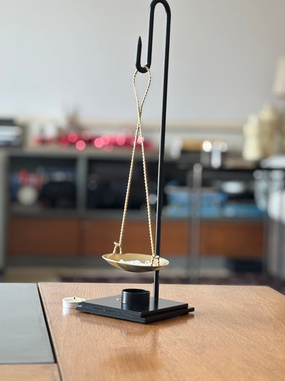 The Brass Balance Burner
