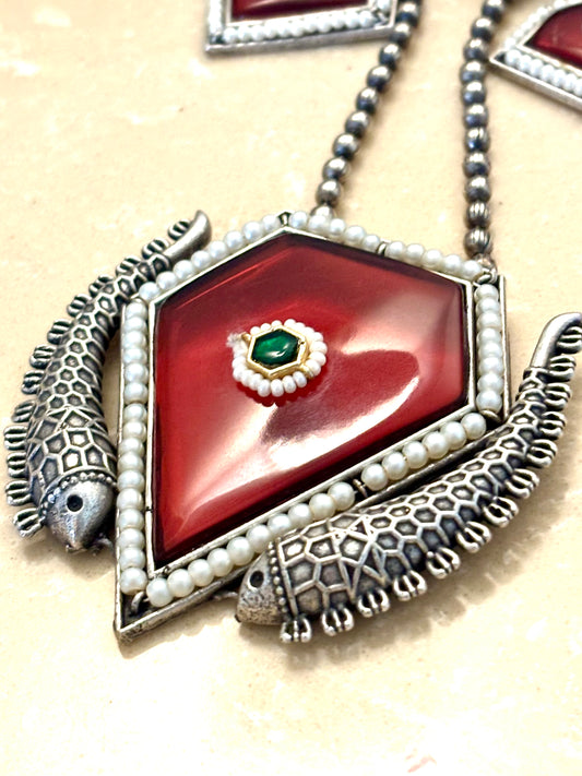 Manika pendent on metal beads string