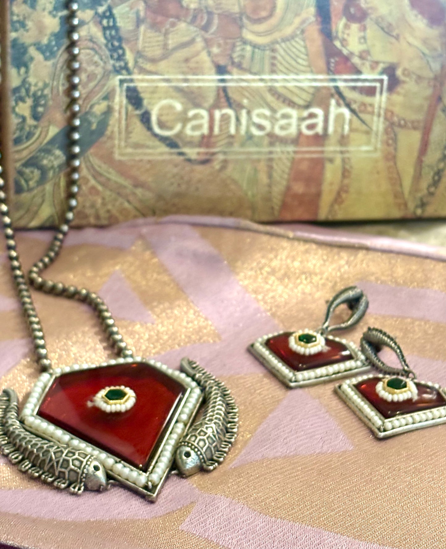 Manika pendent on metal beads string