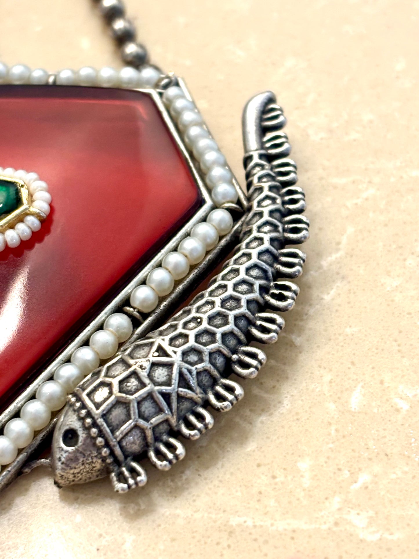 Manika pendent on metal beads string