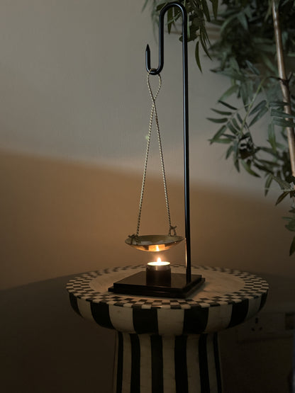 The Brass Balance Burner