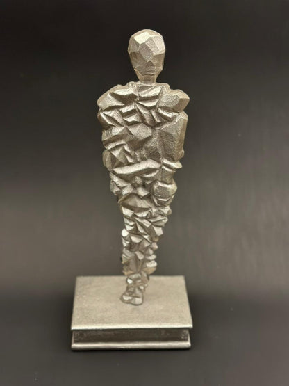 Image of Cleo (in silver) sculpture from august.org.in