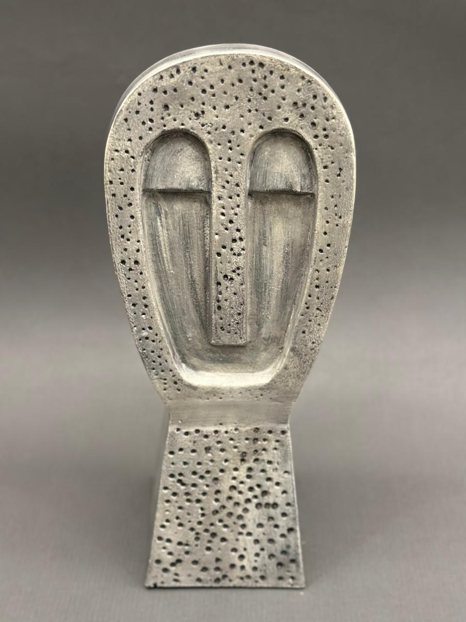 Image of Agantuk in Pewter sculptore from august.org.in.