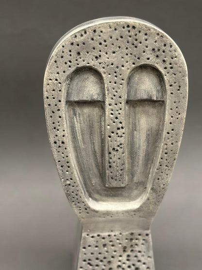 Image of Agantuk in Pewter sculpture from august.org.in.