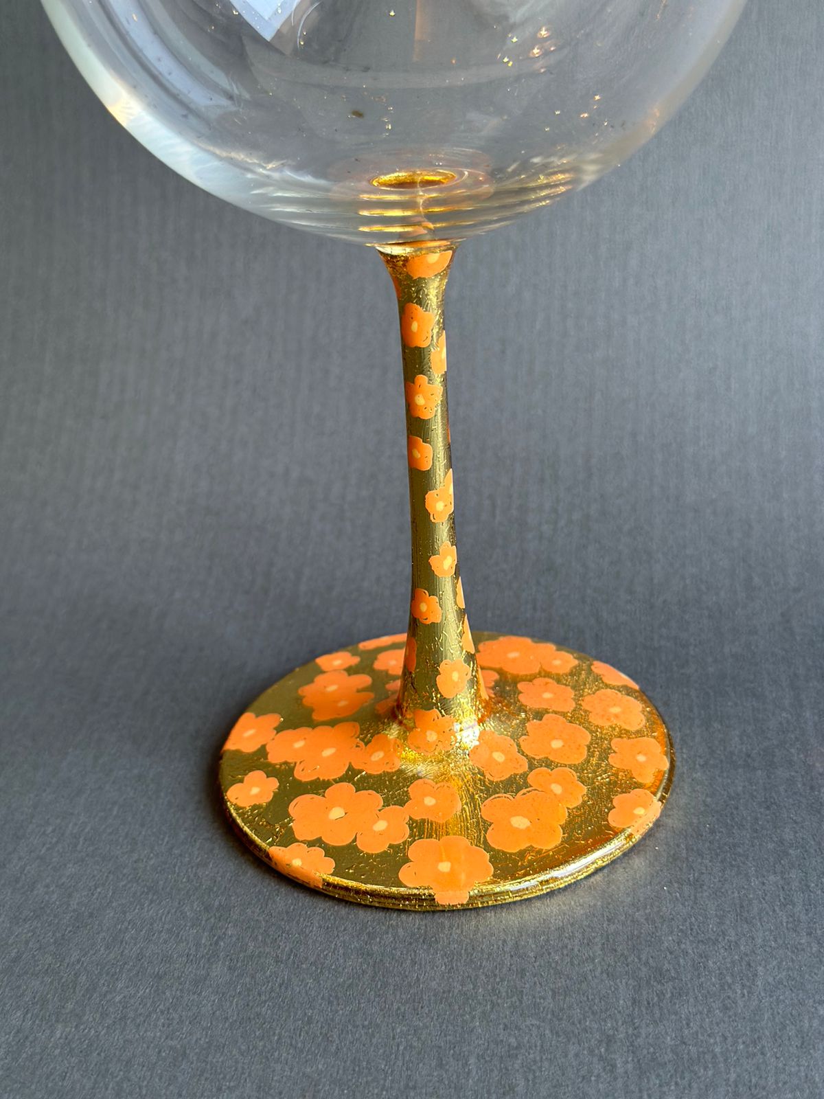 Gin/red wine goblets orange flower